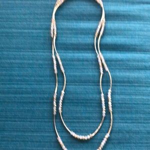 Gold toned bars and beads necklace